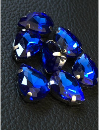 Страз (скло) в металевій оправі. Розмір — 10*14 мм. Колір синій