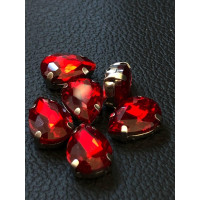 Страз (скло) в металевій оправі. Розмір — 10*14 мм. Колір червоний