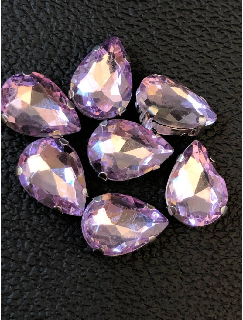 Страз (скло) в металевій оправі. Розмір — 10*14 мм. Колір світло фіолетовий