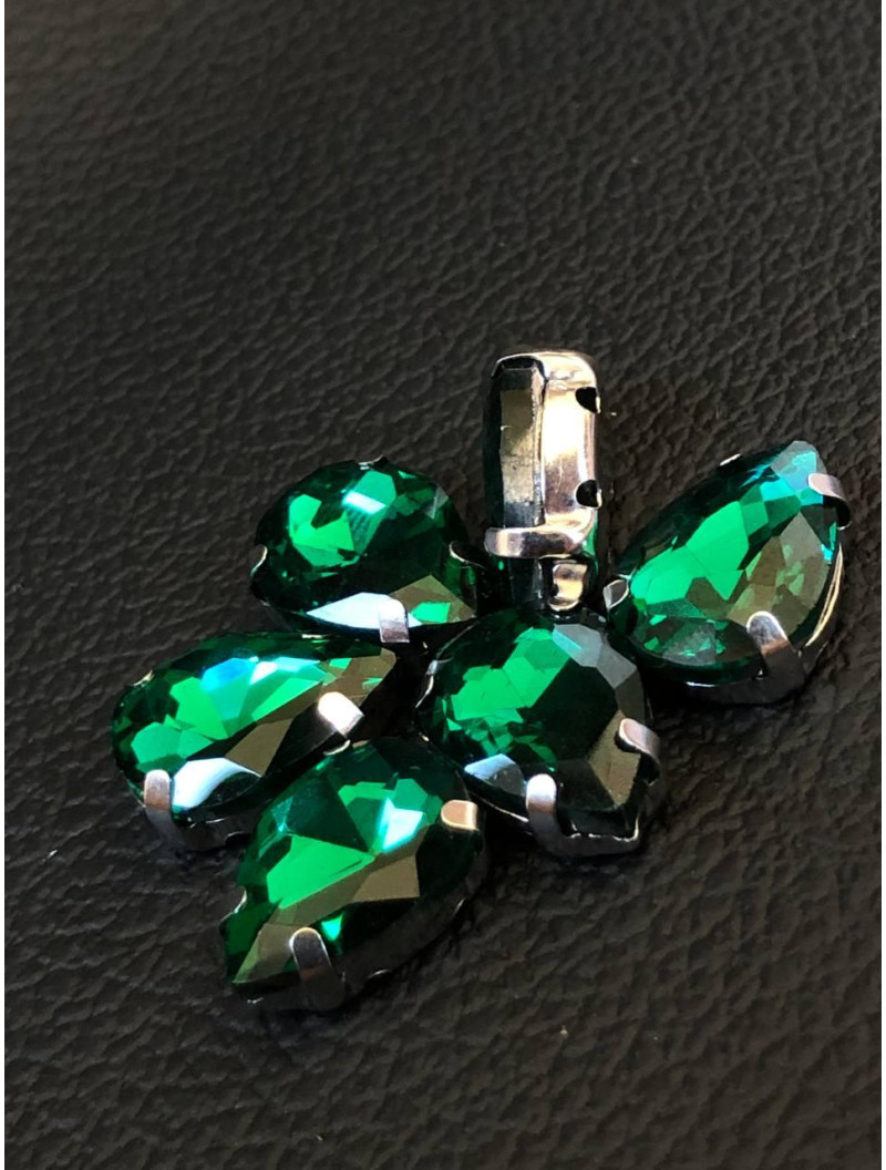 Страз (скло) в металевій оправі. Розмір — 10×14  мм. Колір бірюзовий