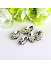 Страз (скло) в металевій оправі. Розмір — 7×15 мм. Колір прозорий