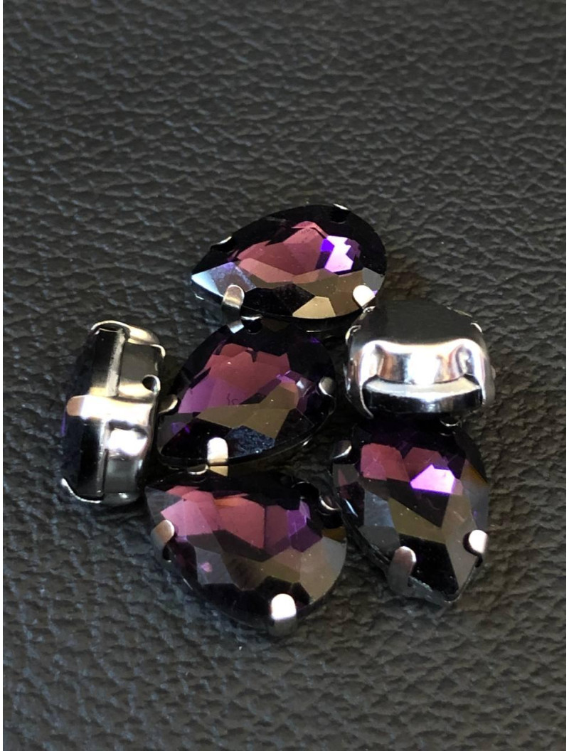 Страз (скло) в металевій оправі. Розмір — 10*14 мм. Колір аметист