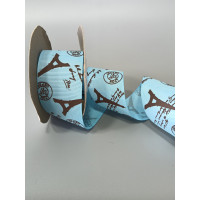 Репсова стрічка. Ширина  4 см. Колір  чорні вежі на блакитному тлі. Ціна вказана за 1 метр