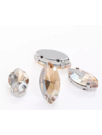 Страз (скло) в металевій оправі. Розмір  6×12 мм. Колір  шампанське