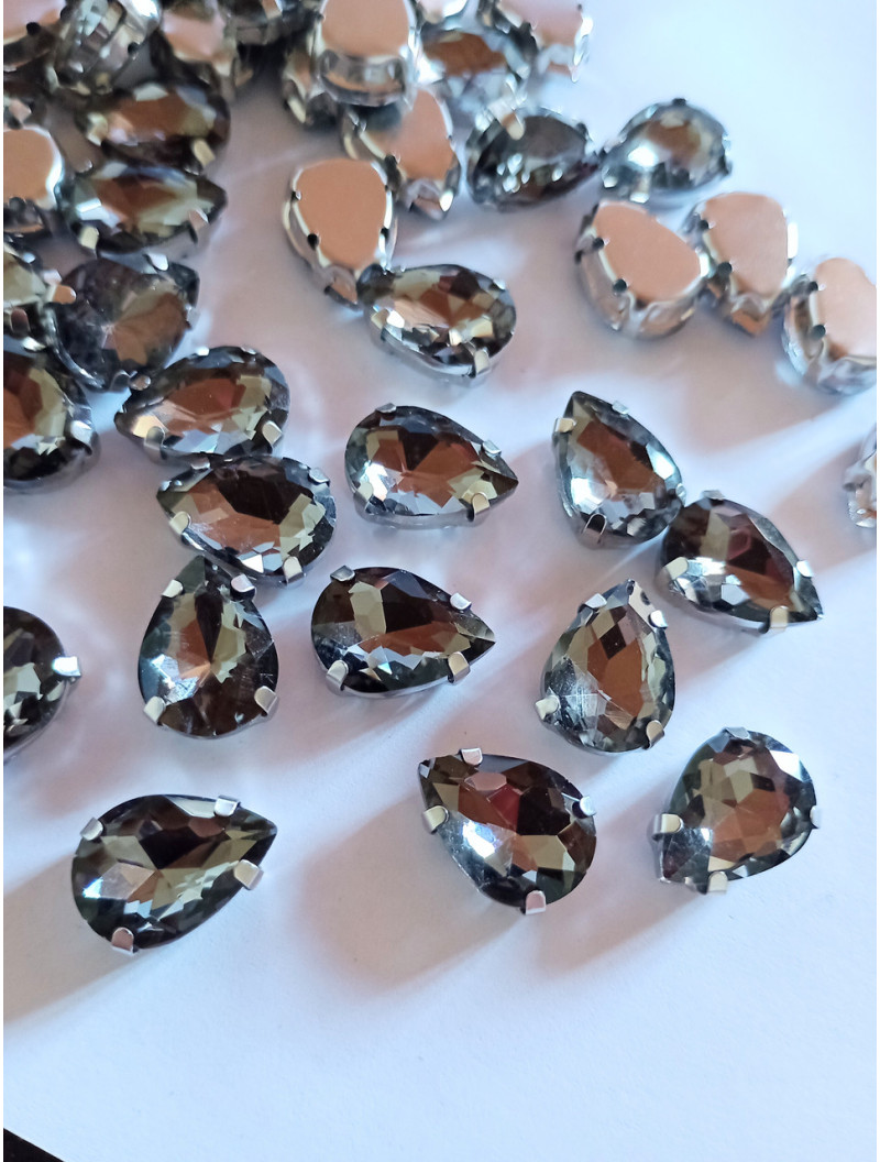 Страз (скло) в металевій оправі. Розмір  10×14 мм. Колір графітовий