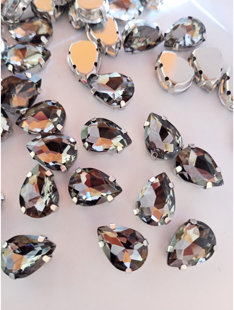 Страз (скло) в металевій оправі. Розмір  10×14 мм. Колір графітовий