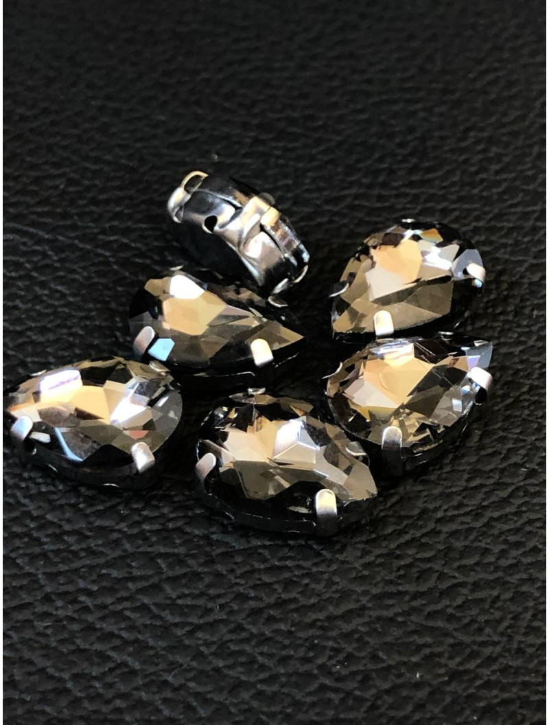 Страз (скло) в металевій оправі. Розмір  10×14 мм. Колір графітовий