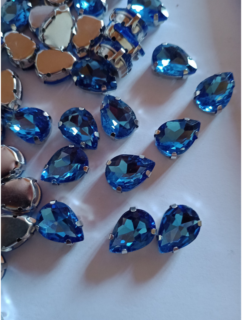 Страз (скло) в металевій оправі. Розмір  10×14 мм. Колір синій світліший