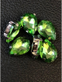 Страз (скло) в металевій оправі. Розмір  10×14 мм. Колір  світло-зелений