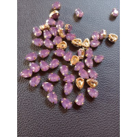 Стразі (акрил) у золотій металевій оправі. Розмір  6*10 мм. Колір  бузок світлий опал