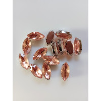 Страз (скло) в металевій оправі. Розмір  7×15 мм. Колір  персиковий