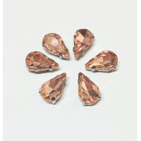 Страз (скло) в металевій оправі. Розмір  8×13 мм. Колір  персиковий