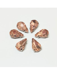 Страз (скло) в металевій оправі. Розмір  8×13 мм. Колір  персиковий