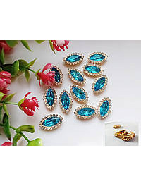 Стразовий декор. Розмір 20×12 мм. Колір блакитний. Ціна вказана за 1 шт.