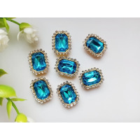 Стразовий декор. Розмір 19×15 мм. Колір блакитний. Ціна вказана за 1 шт.