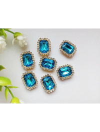 Стразовий декор. Розмір 19×15 мм. Колір блакитний. Ціна вказана за 1 шт.