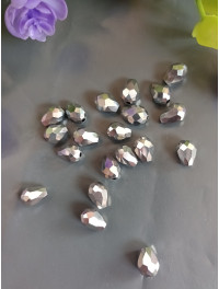 Кришталеві намистини*крапля*. Розмір 6*8 мм. Колір срібний металік. Ціна вказана за 1 шт.