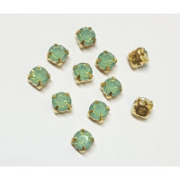 Страз (акрил) у золотій металевій оправі. Розмір  6 мм. Колір салатовий опал