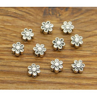 Бусина металлическая *цветок*. Размер 7 мм. отв.1мм. Цвет -серебро. Цена указана за 1 шт