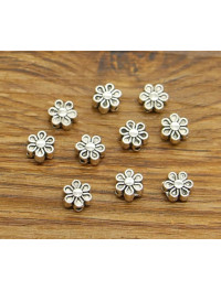 Бусіна металева * Квітка*. Розмір 7 мм. відв.1 мм. срібло. Ціна вказана за 1 шт.