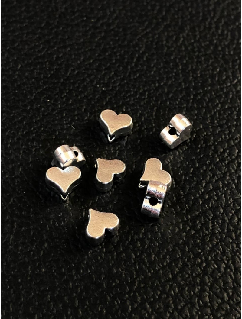 Металева Бусяна "серце" Розмір — 5,6*6,4 мм. Колір — срібло. Ціна вказана за 1 шт.