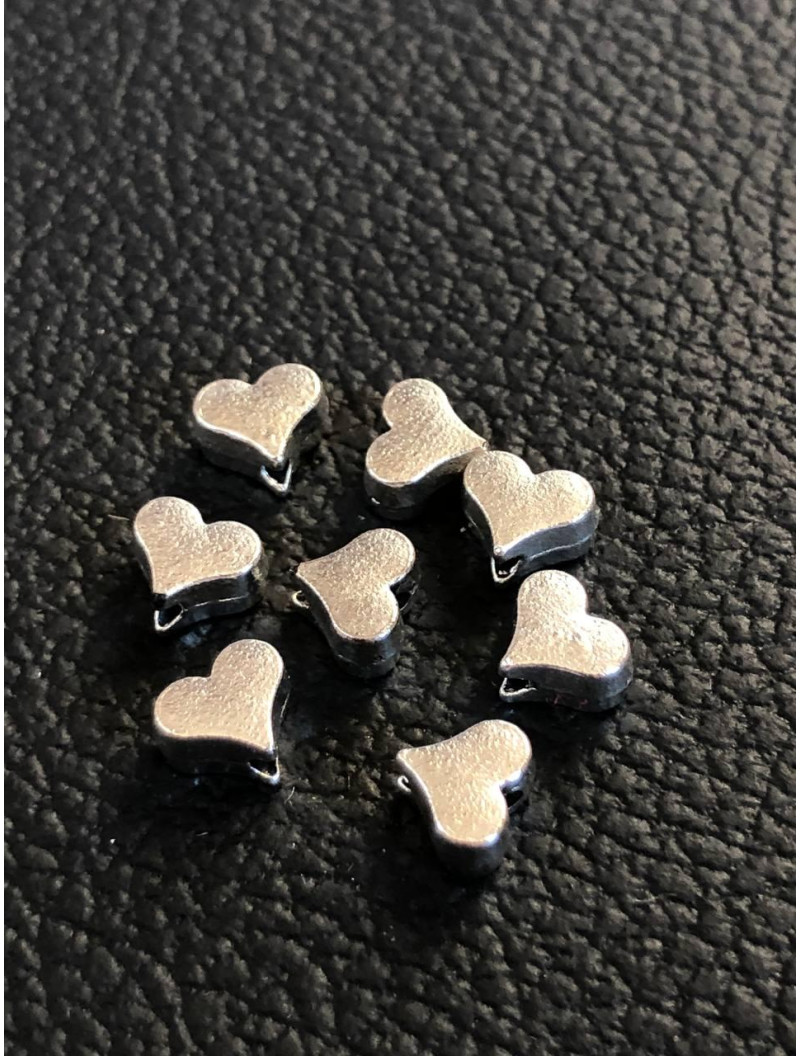 Металева Бусяна "серце" Розмір — 5,6*6,4 мм. Колір — срібло. Ціна вказана за 1 шт.