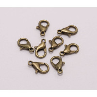 Замок-лобстер (медь с покрытием ). Размер - 14 мм. Цвет - бронза . Упаковка - 5шт.