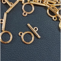 Замок тогл. Розмір — 13х17 мм, колір — золото.