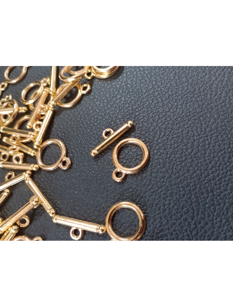 Замок тогл. Розмір — 13х17 мм, колір — золото.