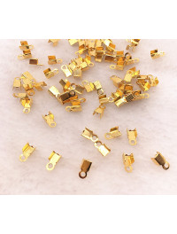 Затискач — кінцевик для волосіні. Розмір — 3×6 мм. Колір — лимонне золото. Паковання — 10 шт.