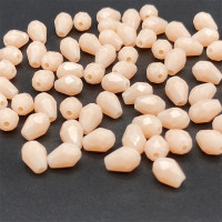 Кришталеві намистини "крапля" Розмір — 4*6 мм. Колір бежевий матовий. Ціна вказана за 1 шт.