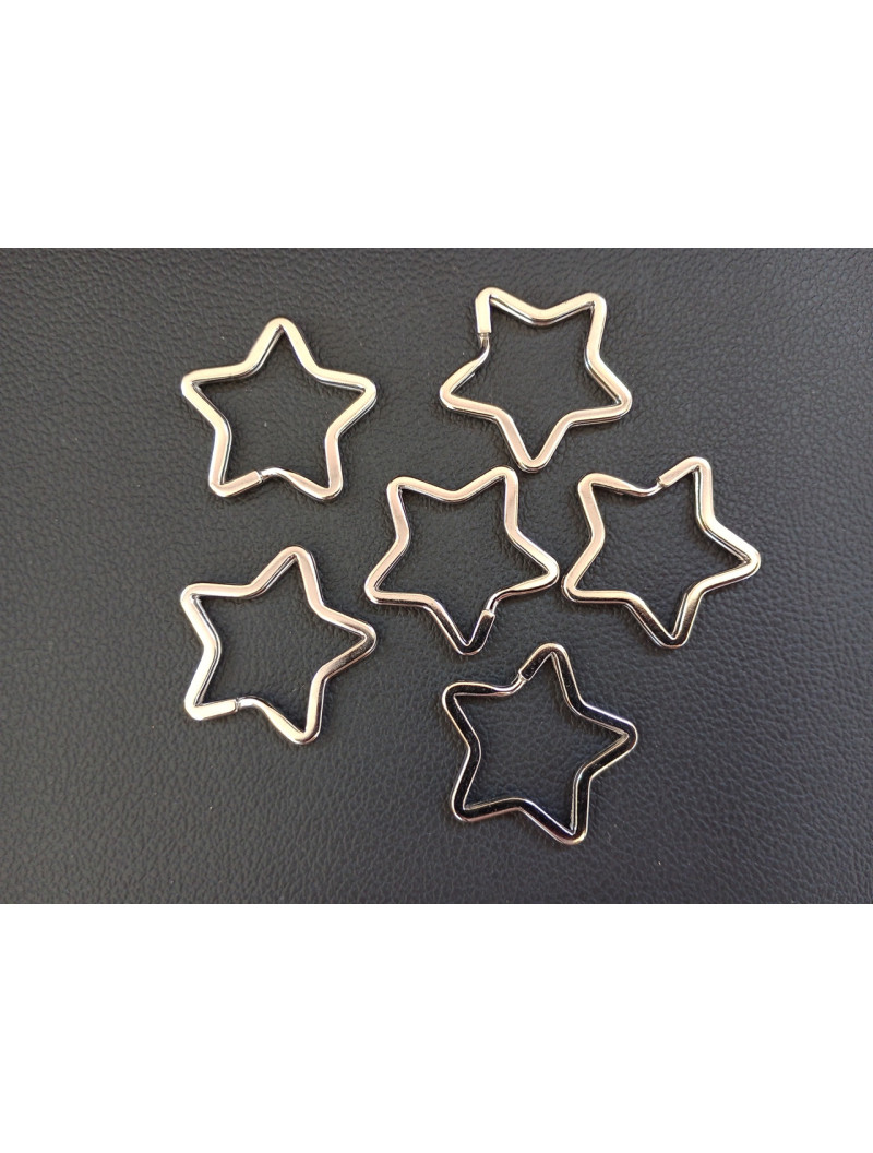 Кільце заводне "зірка" Розмір 32 мм. Колір — срібло.