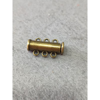 Замок магнитный. Размер - 6*19 мм. На 3 линии. Цвет - бронза.