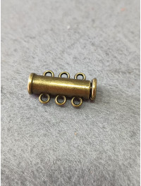 Замок магнітний. Розмір — 6*19 мм. На 3 лінії. Колір - бронза.