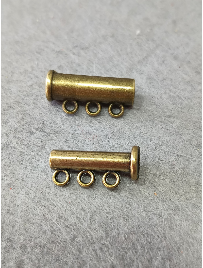 Замок магнітний. Розмір — 6*19 мм. На 3 лінії. Колір - бронза.