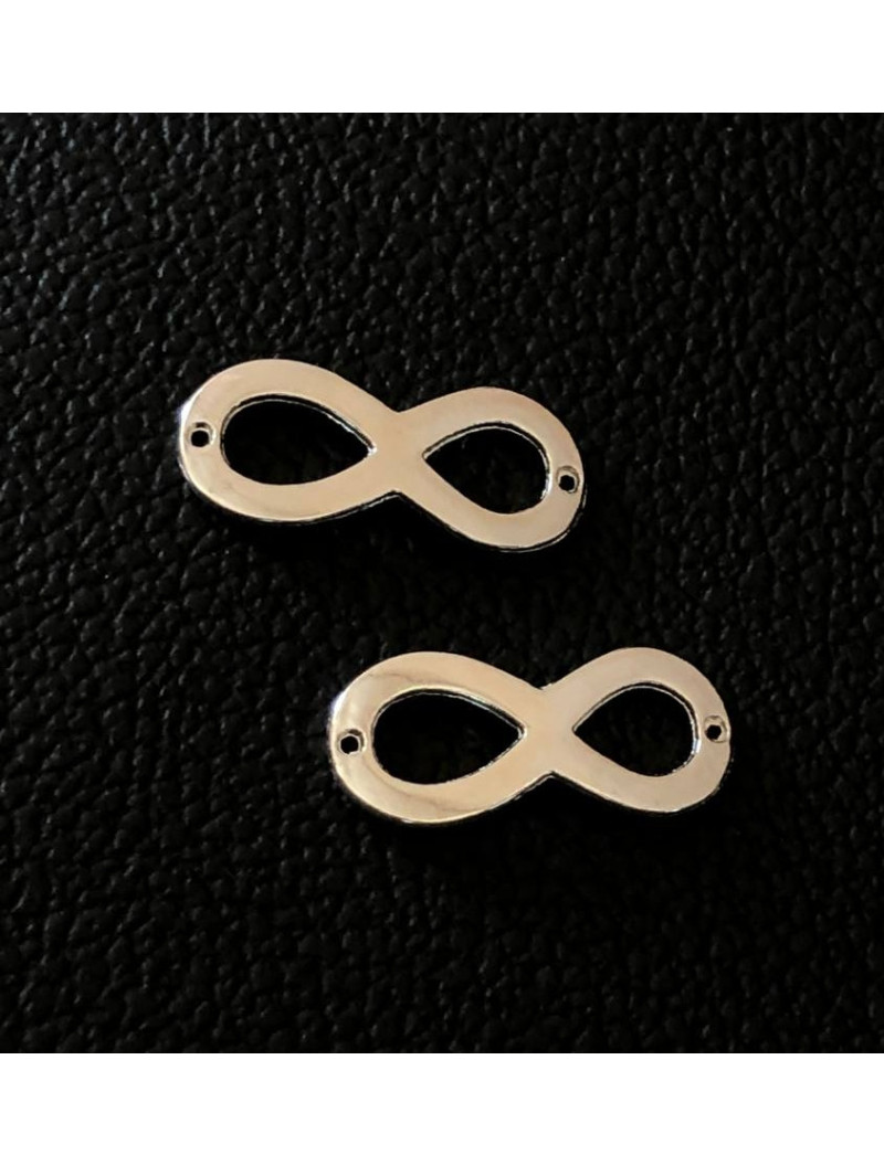 Конектор "безскінченність". Розмір — 22 × 10 мм. Колір — срібло. Ціна вказана за 1 шт.