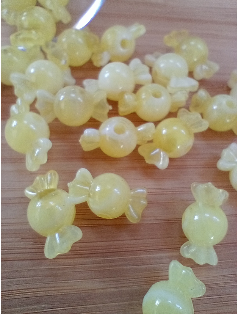 Бусіна "конфетка"/розмір 10 × 18 (від.3 мм)/Квіт — жовтий. Ціна вказана за 10 шт.