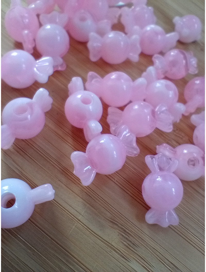 Бусіна "конфетка"/розмір 10 × 18 (від.3 мм)/Квіт рожевий. Ціна вказана за 10 шт.