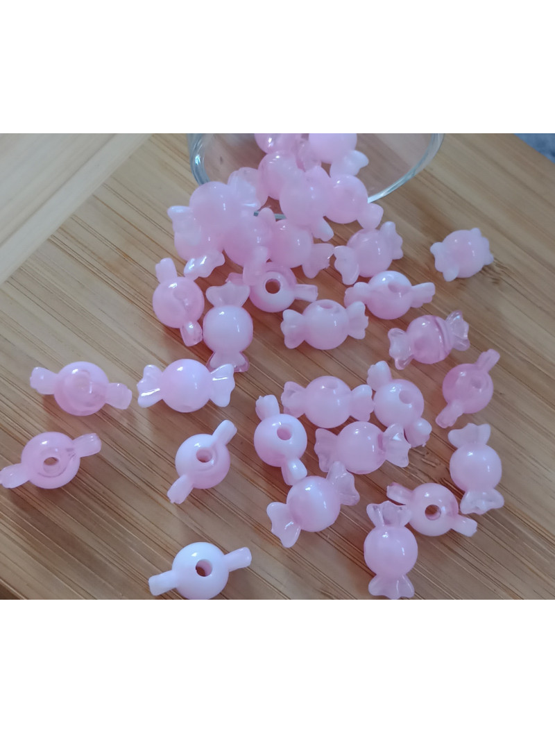 Бусіна "конфетка"/розмір 10 × 18 (від.3 мм)/Квіт рожевий. Ціна вказана за 10 шт.