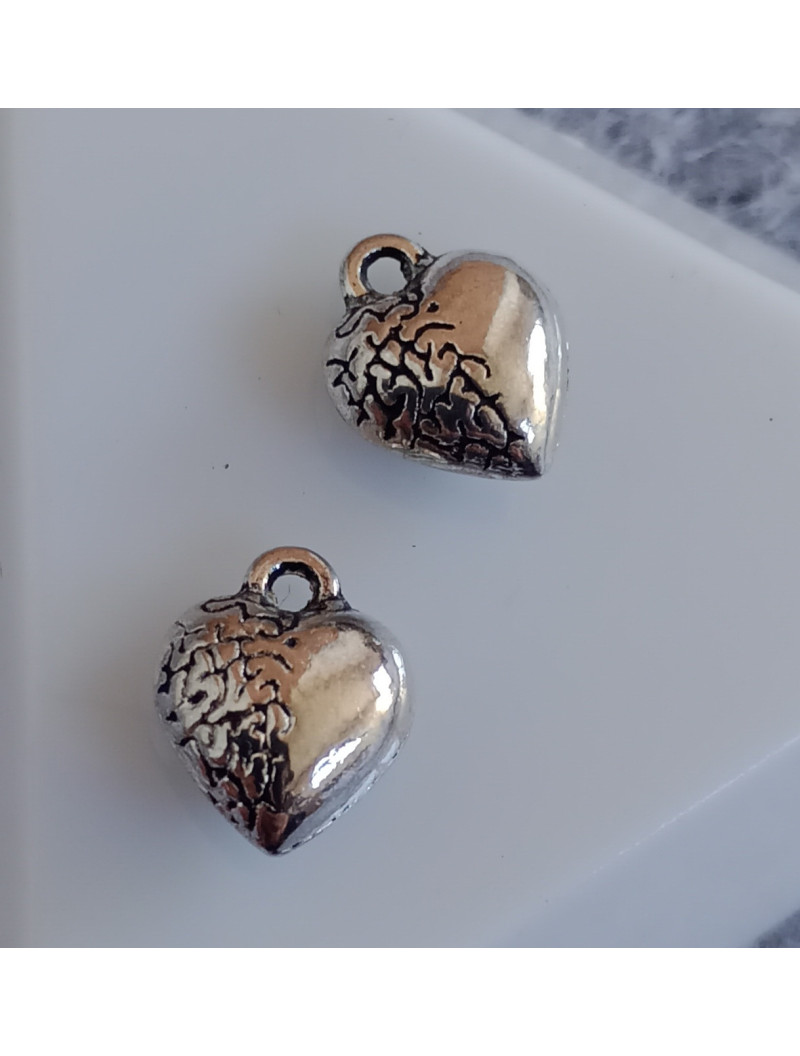 Підвіска/ширина — 1,2х1 см Колір — срібло/ Ціна за 1 шт.