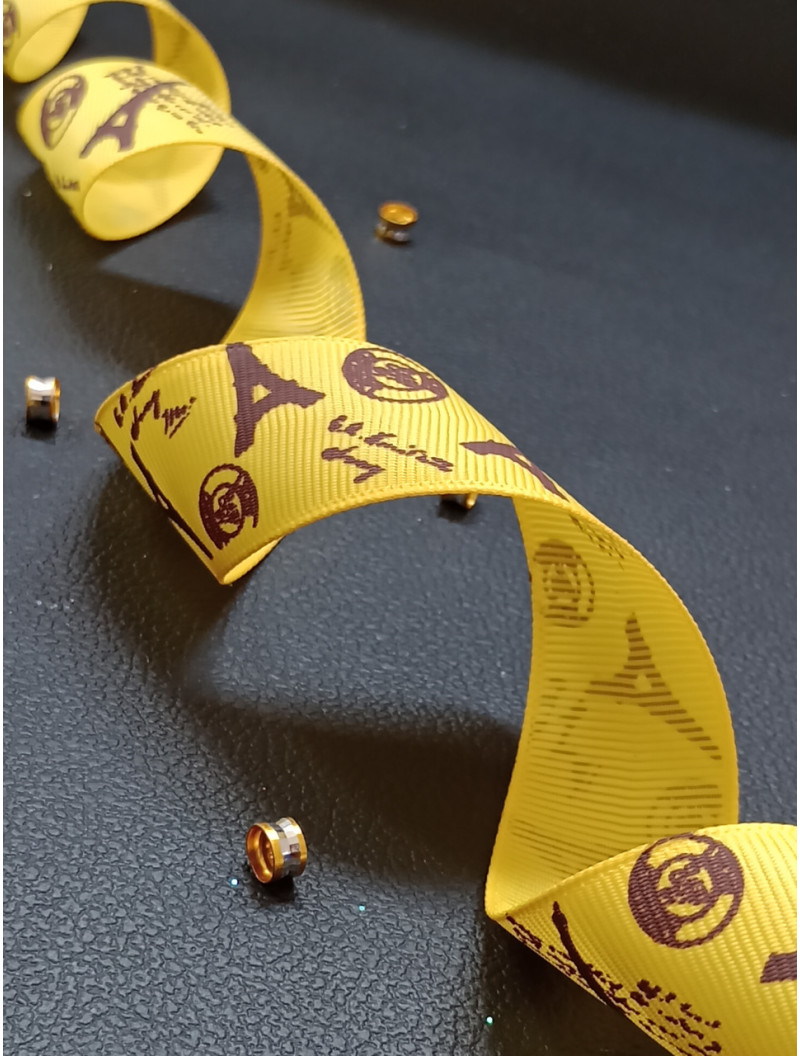 Репсовая лента. Размер - 2.5 см. Цвет - башни на желтом. Цена указана за 1 метр.