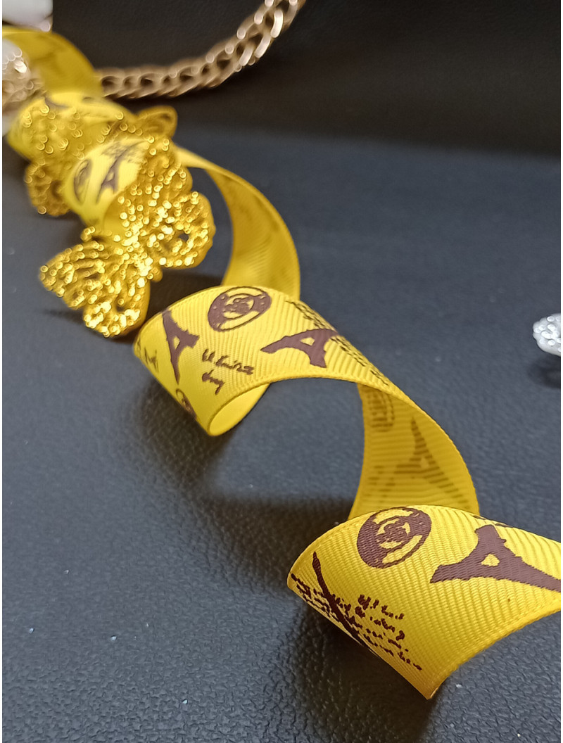 Репсовая лента. Размер - 2.5 см. Цвет - башни на желтом. Цена указана за 1 метр.