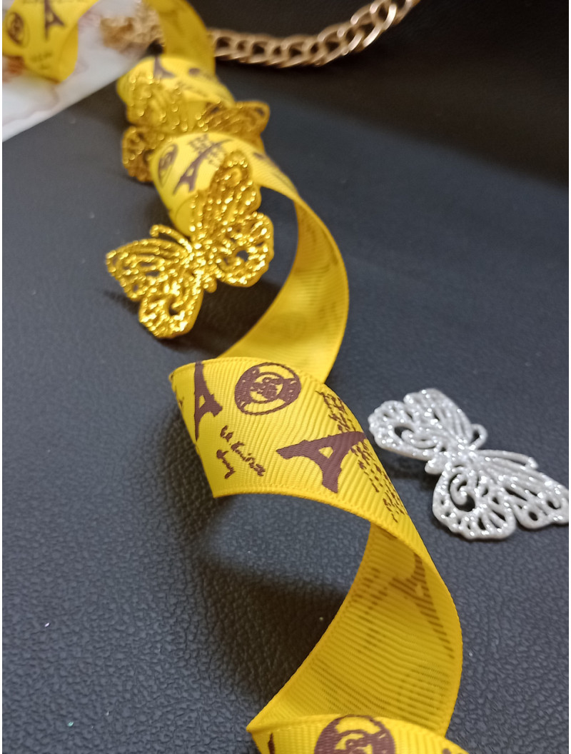 Репсовая лента. Размер - 2.5 см. Цвет - башни на желтом. Цена указана за 1 метр.