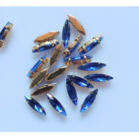 Страз (скло) у Золотій металевій оправі. Розмір — 4×15 мм. Колір синій 5 шт.