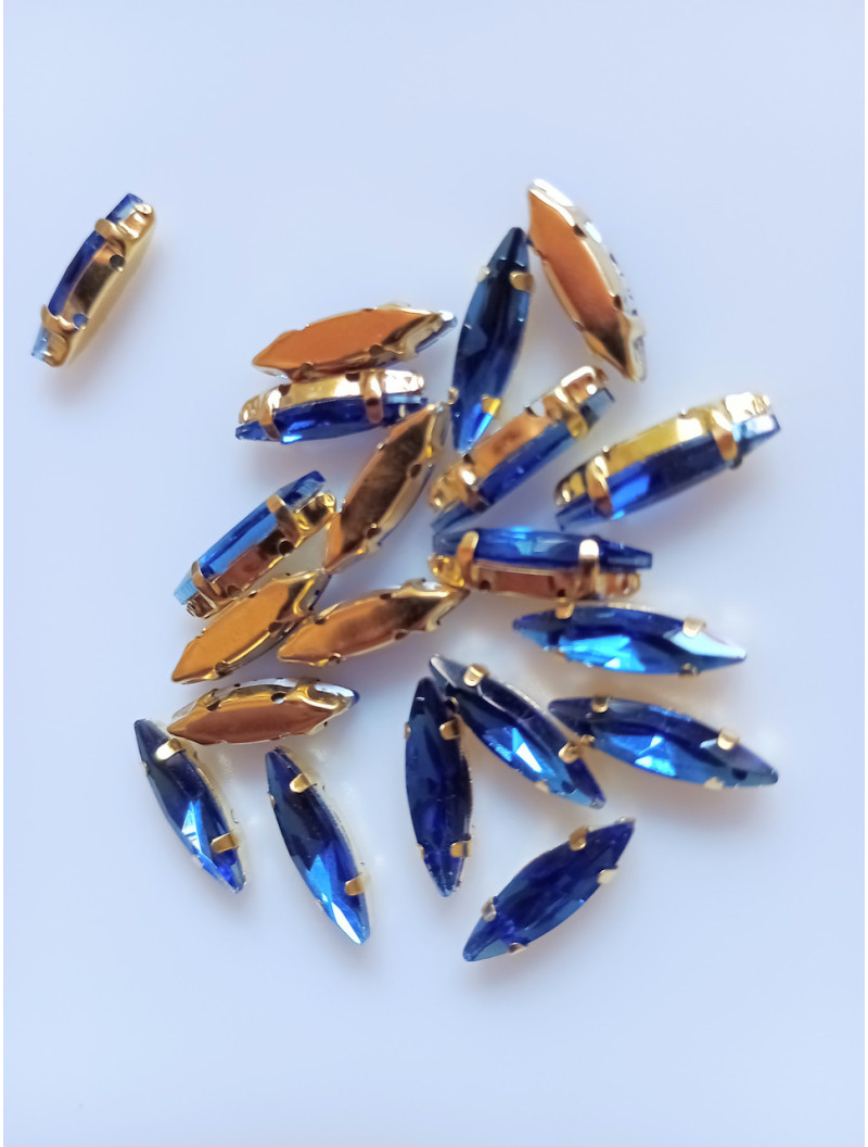 Страз (скло) у Золотій металевій оправі. Розмір — 4×15 мм. Колір синій 5 шт.