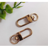 Карабин. Довжина 34 мм. Кільце 10 мм Колір золото. Ціна вказана за 1 шт.