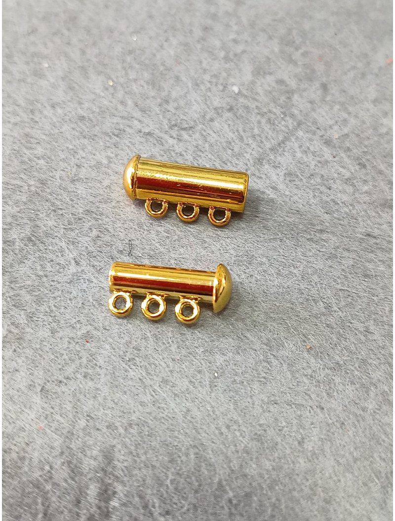 Замок магнітний. Розмір — 6*19 мм. На 3 лінії. Колір — лимонне золото.